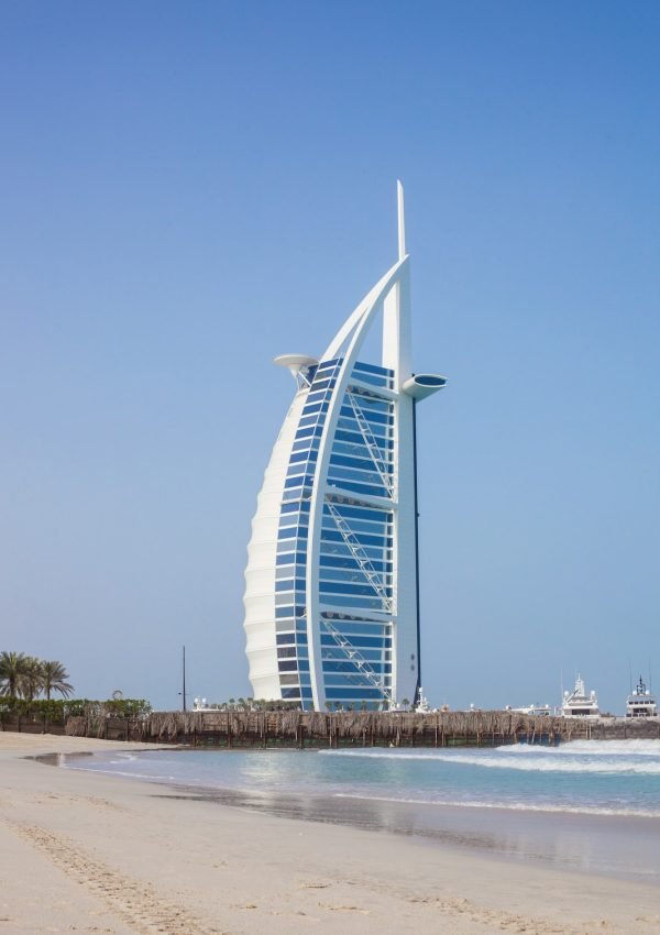 Dubai, UAE, March 2018, Burj al-Arab in the daytime against the background of the sea and blue sky